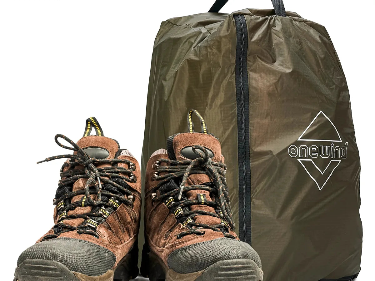 Boot Sack and hiking shoes stored at camp under cover